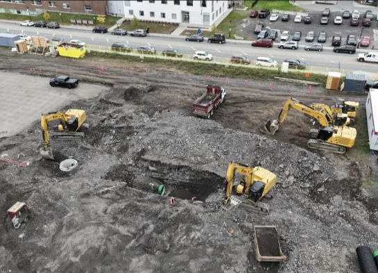 Coordination multi-équipements sur chantier commercial - Excavation Rive-Nord