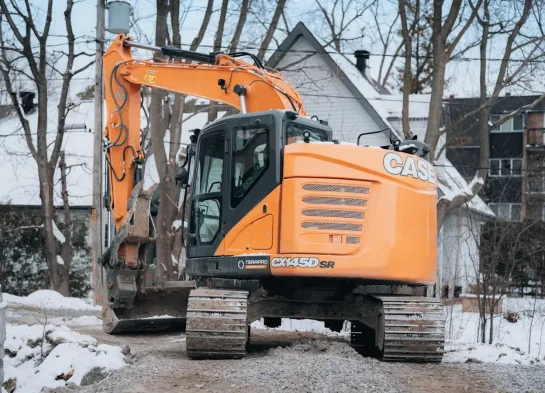 Excavatrice CASE CX145D en chantier résidentiel - Excavation Rive-Nord