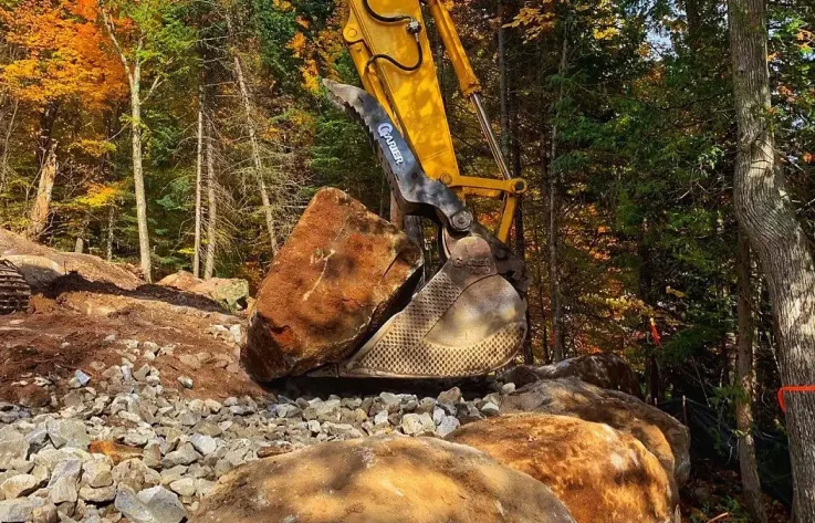 Excavation mur de roches - Laurentides